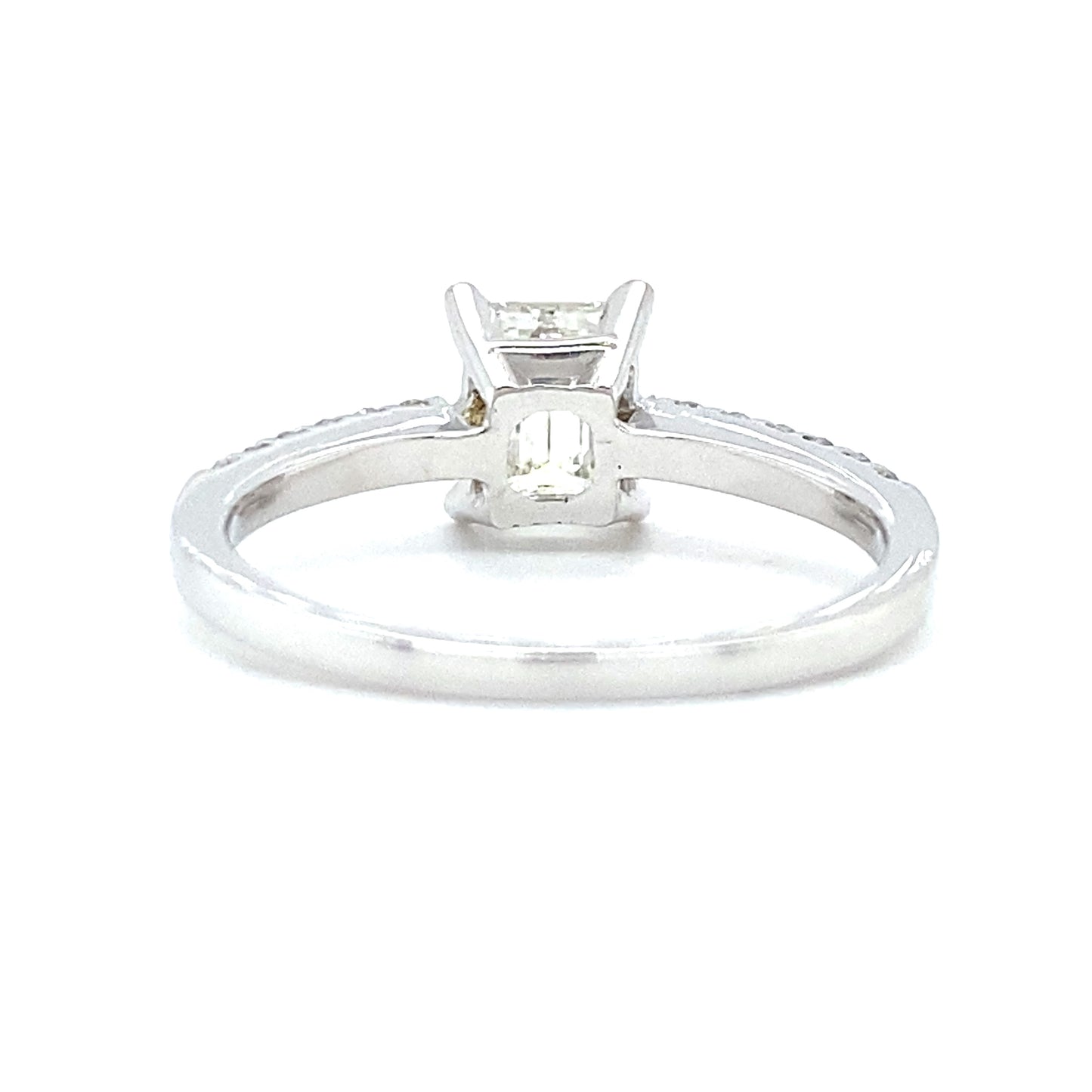18 karaat wit gouden solitair pavé verlovingsring van 3.1 gram. Bezet met 1 Emerald geslepen diamant van 1.04 crt kleur G kwaliteit VS1 en 12 briljant geslepen diamanten met een totaalgewicht van 0.23 crt kleur top wesselton kwaliteit vs zetting: 8 x 6.5 mm Model R 6948