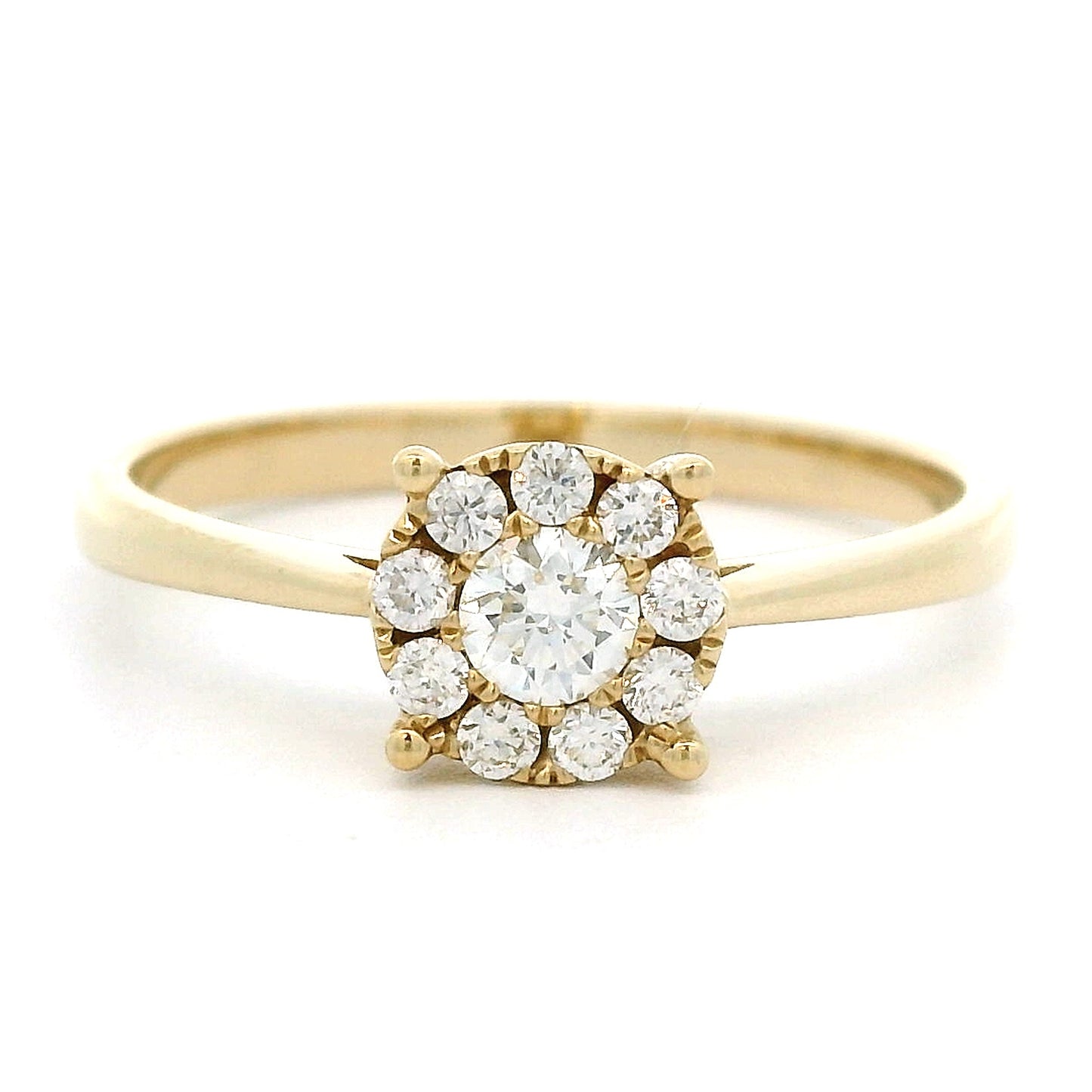 14 karaat geel gouden rozet ring uit de Invisible zetting collectie. Bezet met 1 briljant geslepen diamant evan 0.15 crt en 9 kleinere briljant geslepen diamanten met een totaalgewicht van 0.14 crt Kleur: G Zuiverheid: VS Zetting: Ø 7 mm