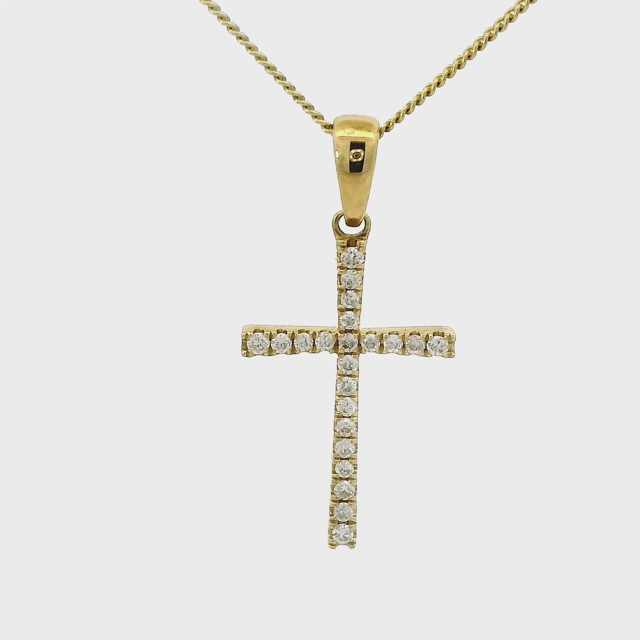 18 karaat geel gouden kruishanger. Bezet met 22 briljant geslepen diamanten met een totaalgewicht van 0.10 crt. Kleur: G Zuiverheid: VS Hanger: 22 x 10 mm