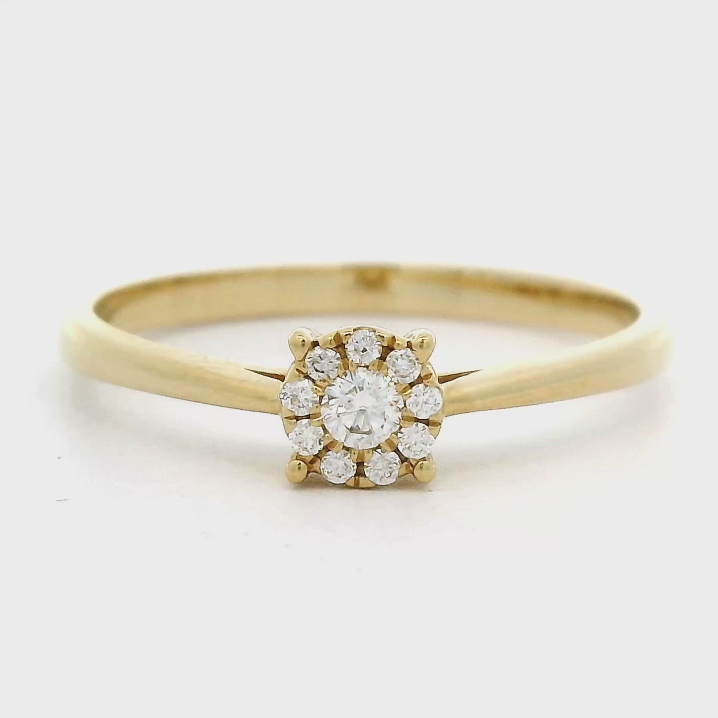 18 karaat geel gouden rozet ring met invisible zetting. bezet met 10 briljant geslepen diamanten met een totaalgewicht van 0.0 crt Kleur: G Zuiverheid: VS Zetting: 5 mm