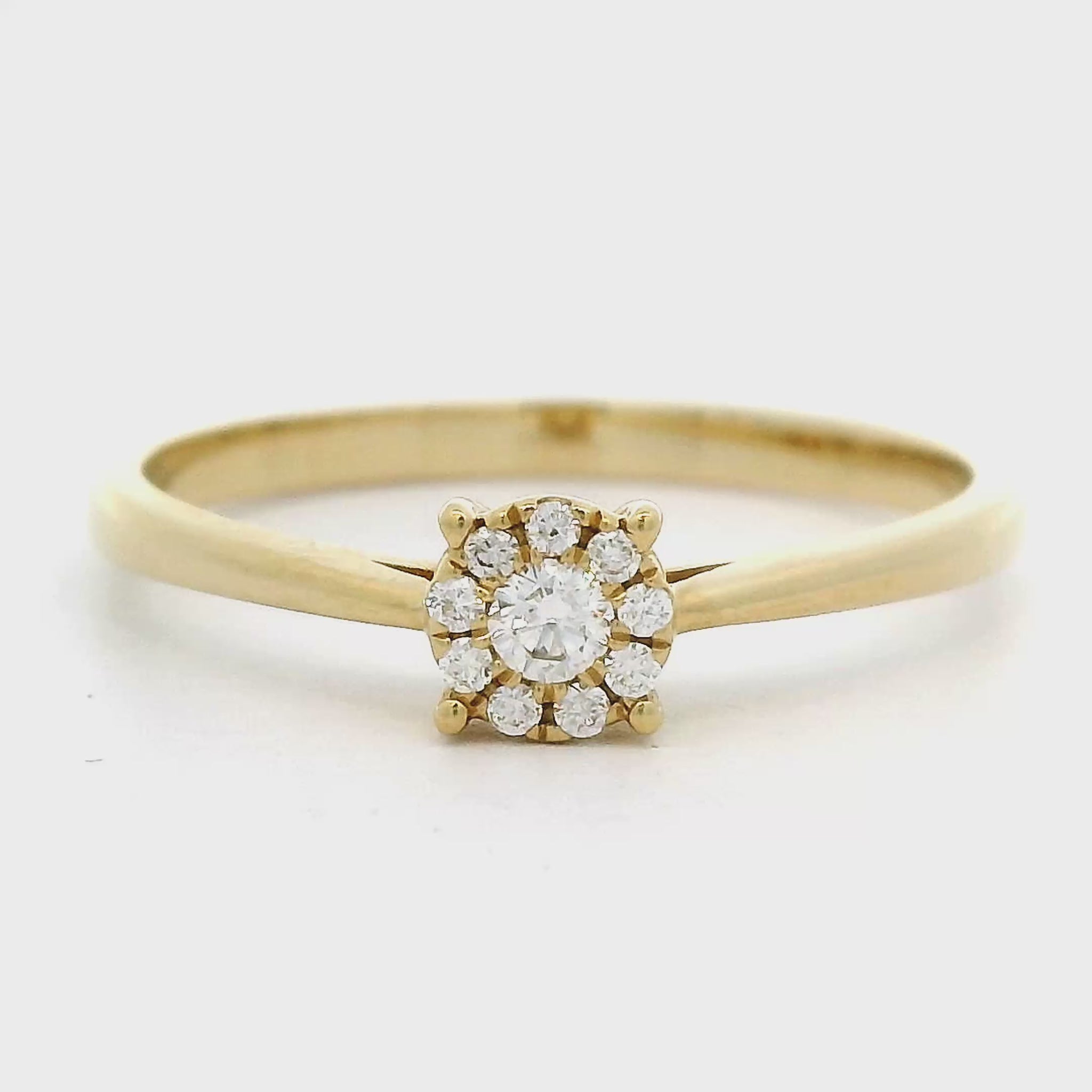 18 karaat geel gouden rozet ring met invisible zetting. bezet met 10 briljant geslepen diamanten met een totaalgewicht van 0.0 crt Kleur: G Zuiverheid: VS Zetting: 5 mm