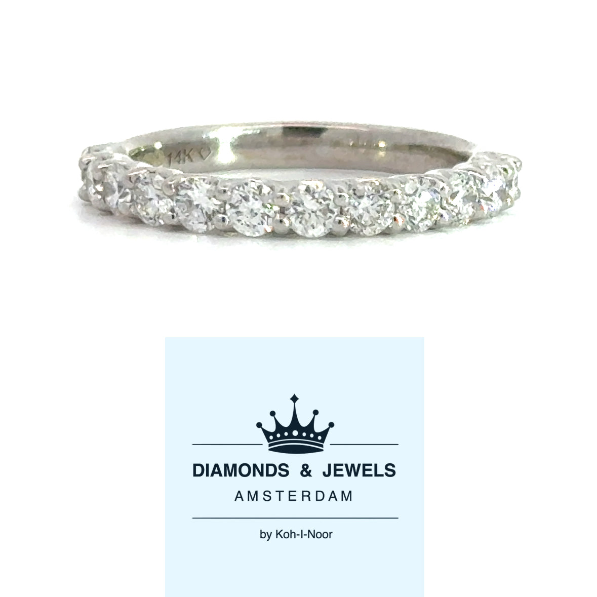 14 karaat wit gouden rijring van 3.2 gram en 3 mm breed. Bezet met 12 briljant geslepen diamanten met een totaalgewicht van 1.00 crt. Kleur: G Kwaliteit: VS2