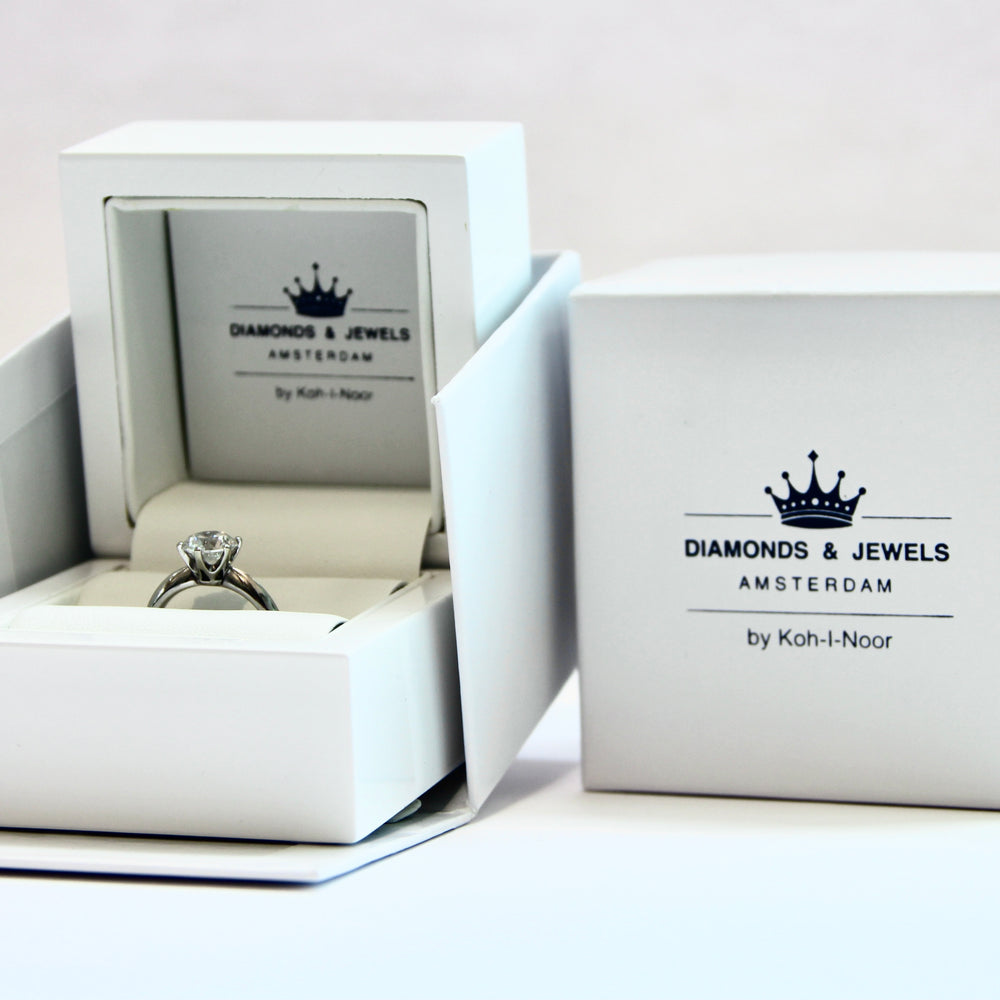
                      
                        White gold solitaire ring Princess R 8266
                      
                    