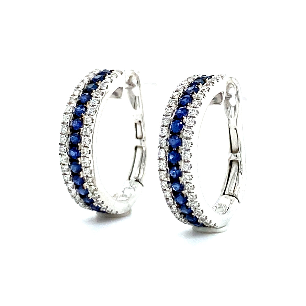 
                      
                        18 karaats witgouden halve creool oorbellen 80 briljant geslepen diamanten 0.22crt kleur Top wesselton kwaliteit vs2 en 28 saffieren 0.31crt 15x4mm model o3837 
                      
                    