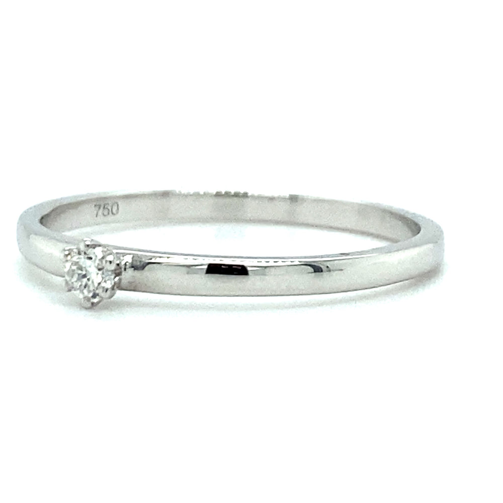 
                      
                        18 karaat witgouden solitair ring met 1 briljant geslepen diamant van 0.05 crt kleur top wesselton kwaliteit si model r9468 €400  Alt-tekst bewerken
                      
                    