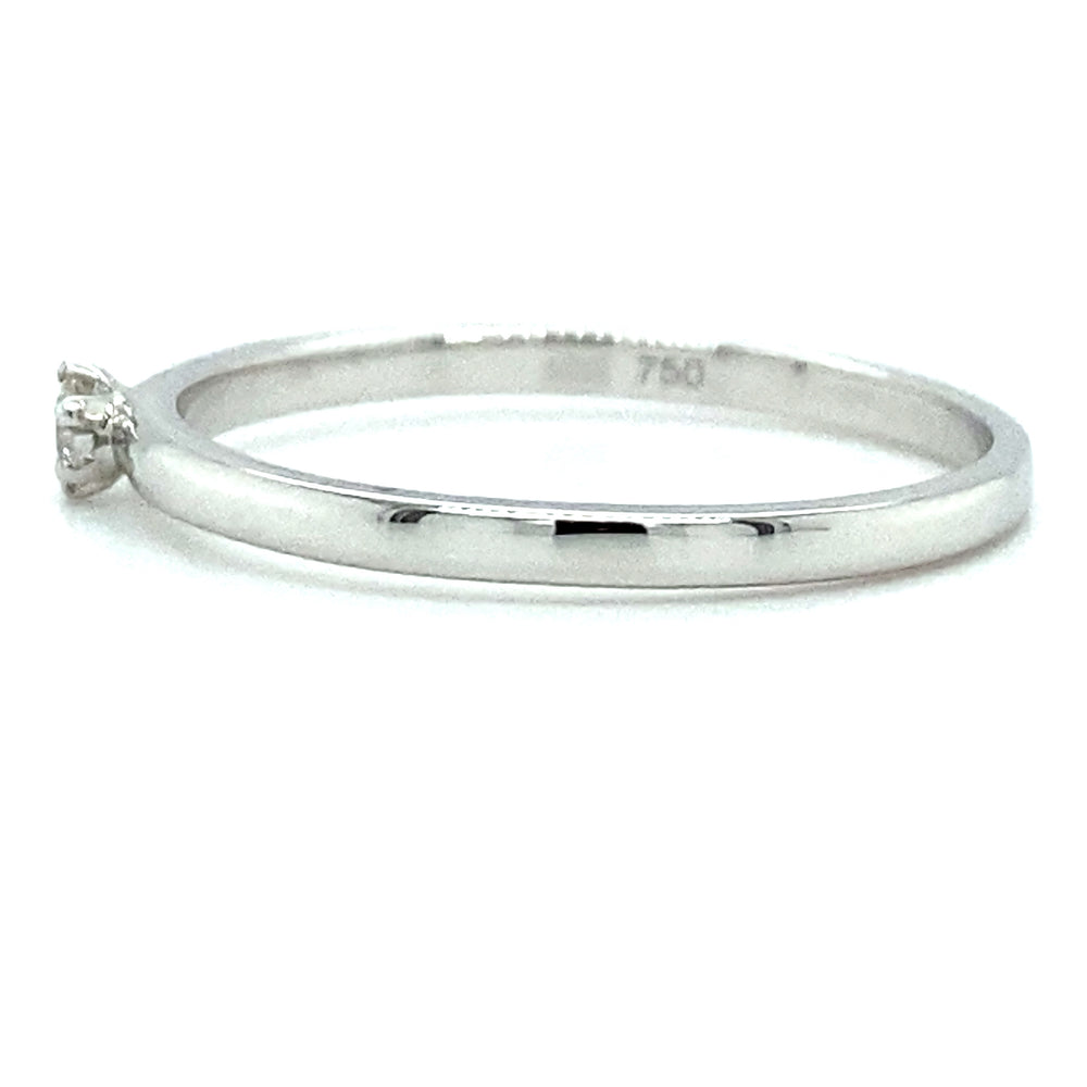 
                      
                        18 karaat witgouden solitair ring met 1 briljant geslepen diamant van 0.05 crt kleur top wesselton kwaliteit si model r9468 €400  Alt-tekst bewerken
                      
                    