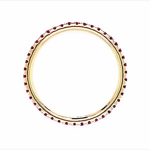 18 karaat geel gouden alliance eternity ring van 2.1 gram en 2 mm breed. Bezet met briljant geslepen robijnen met een totaalgewicht van 0.53 crt. Model: R 9808